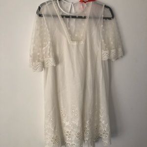 NWT white baby doll style dress from Italy.